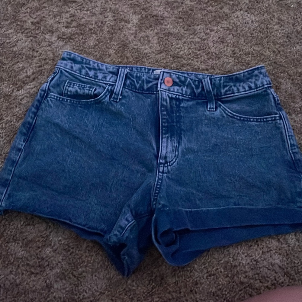 small, dark blue, worn, universal thread.